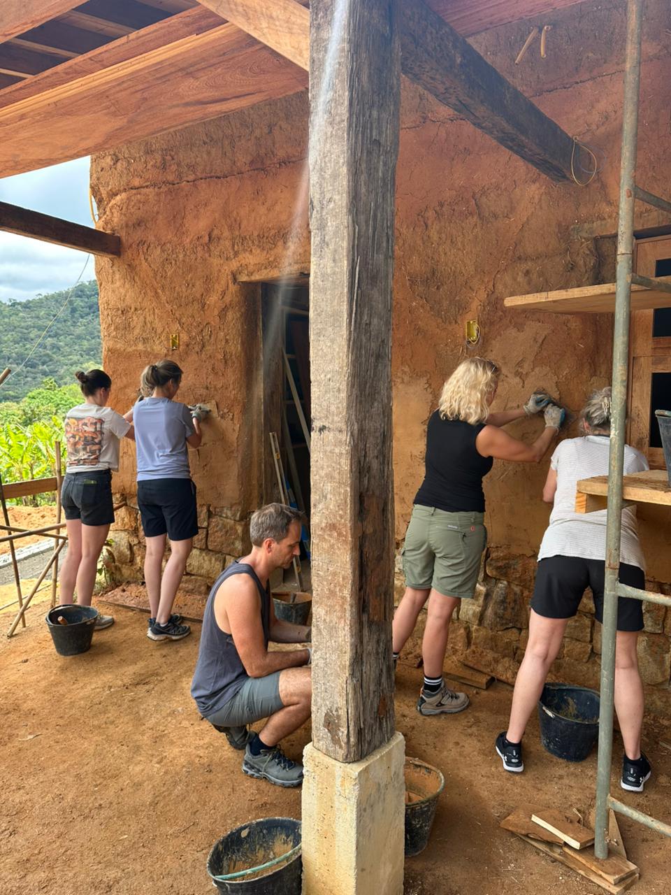 Dutch teachers taking part in hands-on natural building activity at Eco Caminhos