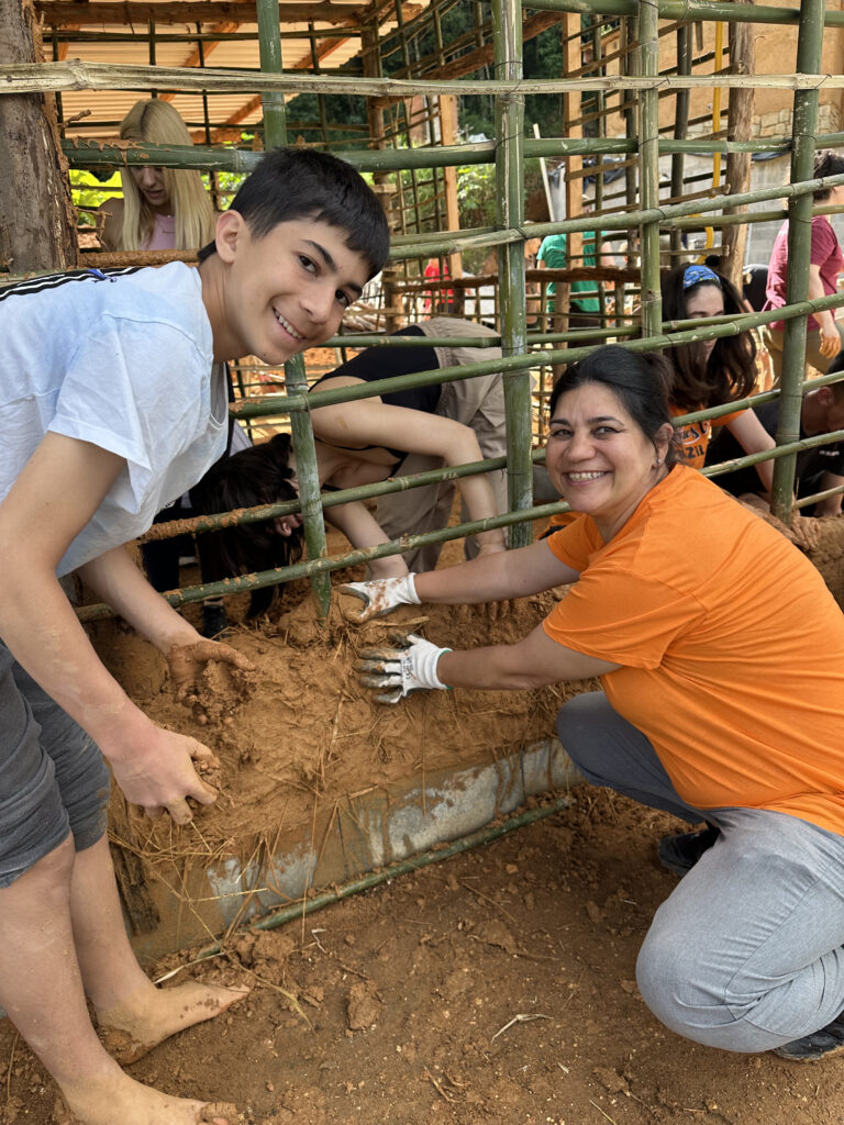Volunteers Building with Natural Materials